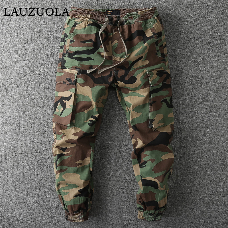 Mens Fashion Camo Pants - กางเกงคาร์โก้ลายพรางวินเทจหลายกระเป๋าสำหรับผู้ชาย แฟชั่นปี 2026 เอวยางยืดพร้อมเชือกผูก กางเกงลำลองสำหรับทำงาน กางเกงจ็อกเกอร์สำหรับผู้ชายใส่เที่ยวกลางแจ้ง